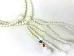 White Beads with S.G.I. Tassel